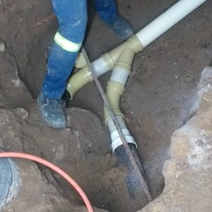 Installation of under graund drain pipe. Cast Iron Drain Replacement