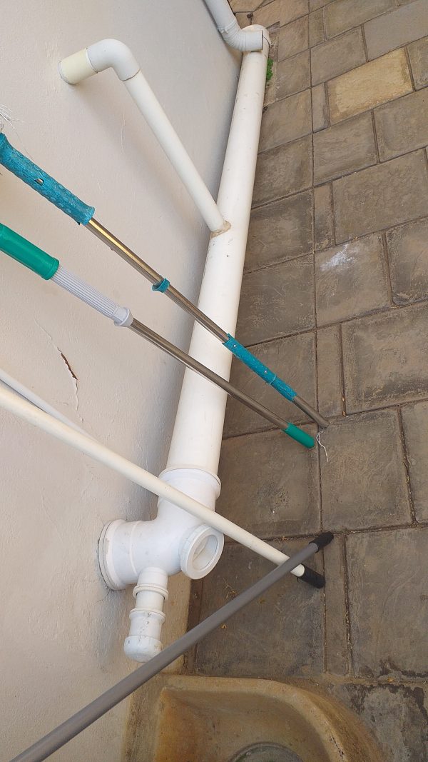 outside toilet pvc pipe with an inspection eye