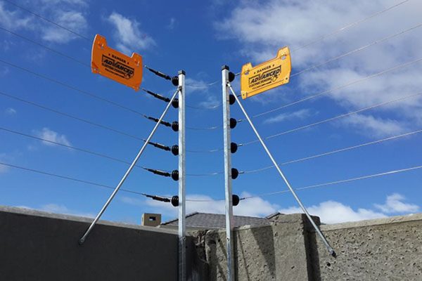 Electrical Fence Installation. 8 stands fence with warnng signs