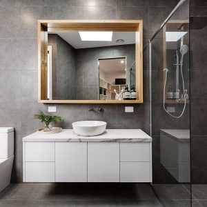 Bathroom renovation. Tiling, Mirror hanging, cupboards installation basin installation bathtab installation