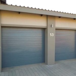 Double garage door installation by Juspropa