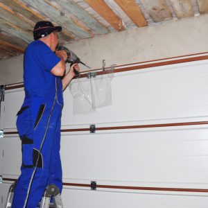 Garage door repairs and garage door installation with garage motor