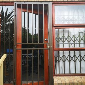 Security Gate Installation. Swing gate for the burglar door