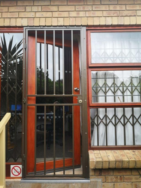 Security Gate Installation. Swing gate for the burglar door