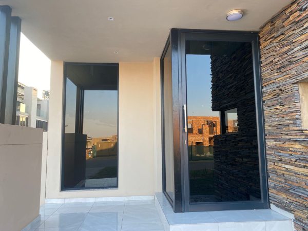 Window Tint Installation or Window Tinting by application of window film on House windows and doors for Privacy by Juspropa